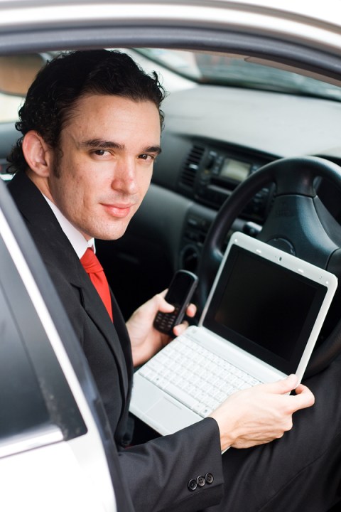 bigstock-Young-salesman-on-business-tri-5981723